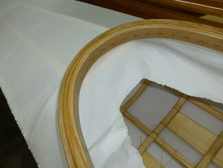 Check the fit - The coaming riser with lip is drilled to be sewn to the skin, and treated with Epifanes Teak Oil Sealer